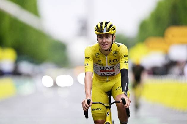 Slovenian Tadej Pogacar of UAE Team Emirates crosses the finish line at stage 21 of the 2025 Tour de France cycling race, from Mantes-la-Ville to Paris (120km), on Sunday 27 July 2025 in France. The 112th edition of the Tour de France starts on Saturday 5 July in Lille, France, and will finish in Paris, France on the 27th of July. DIRKxWAEM  x130131708x