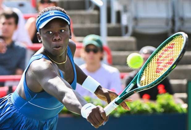 July 27, 2025, Montreal, Pq, Canada: Victoria Mboko, of Canada, plays a shot to Kimberly Birrell, of Australia, during their first round match at the National Bank Open tennis tournament in Montreal, Sunday, July 27, 2025. Victoria Mboko, Kimberly Birrell,  - ZUMAc35_ 20250727_zaf_c35_025 Copyright: xGrahamxHughesx