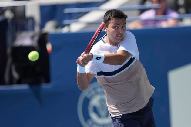 ATP, Tennis Herren Masters 1000 National Bank Open Toronto Presented by Rogers 2025 - Day2 Tomas Barrios Vera of Chile plays a backhand against Gael Monfils of France during the Men s Singles first round match on day 2 of the ATP Masters 1000 National Bank Open at Sobeys Stadium. on July 27, 2025 in Toronto, Canada. (Photo by Leonardo Ramirez Eyepix Group) Copyright: xLeonardoxRamirez xEyepixxGroupx LR_27072025_163007