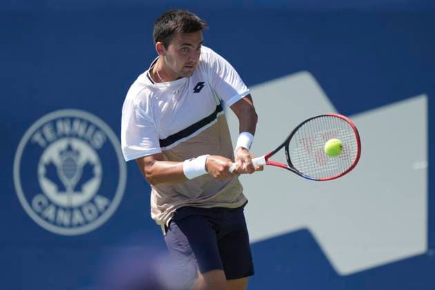 ATP, Tennis Herren Masters 1000 National Bank Open Toronto Presented by Rogers 2025 - Day2 Tomas Barrios Vera of Chile plays a backhand against Gael Monfils of France during the Men s Singles first round match on day 2 of the ATP Masters 1000 National Bank Open at Sobeys Stadium. on July 27, 2025 in Toronto, Canada. (Photo by Leonardo Ramirez Eyepix Group) Copyright: xLeonardoxRamirez xEyepixxGroupx LR_27072025_163005