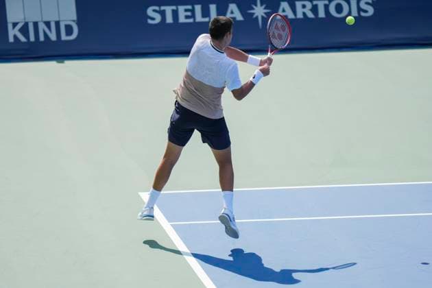 July 27, 2025, Toronto, Ontario, Canada: Tomas Barrios Vera of Chile plays a backhand against Gael Monfils of France during the Men s Singles first round match on day 2 of the ATP, Tennis Herren Masters 1000 National Bank Open at Sobeys Stadium. on July 27, 2025 in Toronto, Canada. Toronto Canada - ZUMAe321 20250727_zsa_e321_135 Copyright: xLeonardoxRamirezx
