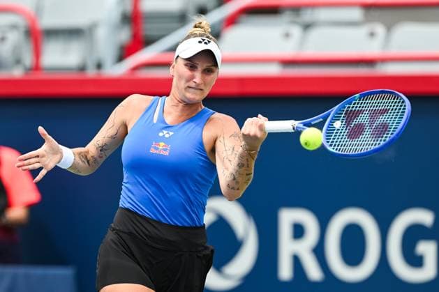 MONTREAL, QC - JULY 27: Marketa Vondrousova (CZE) returns the ball during a first round match at WTA, Tennis Damen National Bank Open on July 27, 2025 at IGA Stadium in Montreal, QC (Photo by David Kirouac Icon Sportswire) TENNIS: JUL 27 National Bank Open EDITORIAL USE ONLY Icon250727039