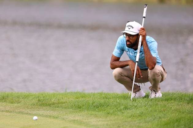 July 27, 2025, Blaine, Minnesota, United States: AKSHAY BHATIA lines up his putt at hole fourteen on the fourth and final day of competition at the 2025 PGA, Golf Herren 3M Open at TPC Twin Cities. Blaine United States - ZUMAt166 20250727_zsp_t166_076 Copyright: xMichaelxTurnerx