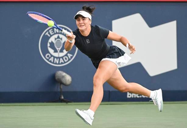 July 27, 2025, Montreal, Pq, Canada: Bianca Andreescu, of Canada, lunges for the ball during her first round match against Barbora Krejcikova, of the Czech Republic, at the National Bank Open tennis tournament in Montreal, Sunday, July 27, 2025. Barbora Krejcikova, Bianca Andreescu, - ZUMAc35_ 20250727_zaf_c35_035 Copyright: xGrahamxHughesx