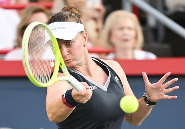 July 27, 2025, Montreal, Pq, Canada: Barbora Krejcikova, of the Czech Republic, plays a shot to Bianca Andreescu, of Canada, during their first round match at the National Bank Open tennis tournament in Montreal, Sunday, July 27, 2025. Barbora Krejcikova, Bianca Andreescu, - ZUMAc35_ 20250727_zaf_c35_067 Copyright: xGrahamxHughesx