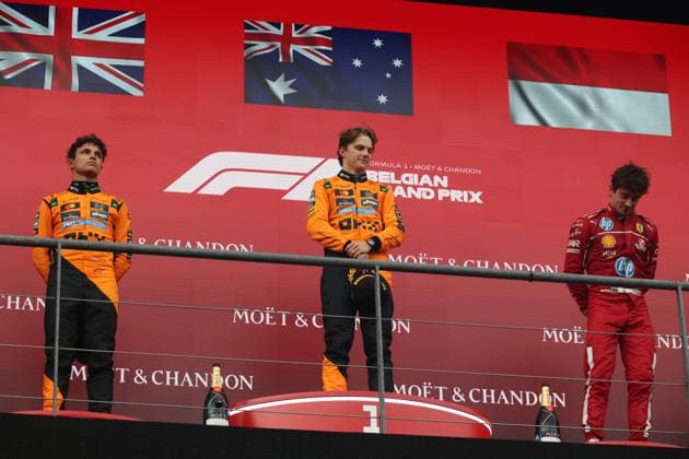 Formula 1 of Belgium Winner Australian driver Oscar Piastri (M) of McLaren F1 Team, second place for British driver Lando Norris (L) of McLaren F1 Team and third place for Monegasque driver Charles Leclerc (R) of Scuderia Ferrari HP on the Podium after the Formula 1 Moet & Chandon Belgian Grand Prix 2025 at the Circuit de Spa-Francorchamps in Spa, Belgium, July 27 2025. Spa-Francorchamps Belgium Copyright: xMatrixxImagesx xHasanxBraticx 