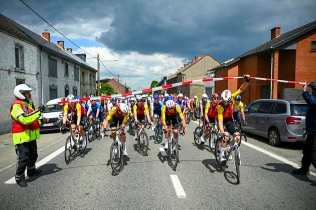 Tour de Wallonie 2025 Stage 3 ANTOING, BELGIUM - JULY 28 : Peloton stopped in front of a railroad during stage 3 of the 30th edition of Tour de Wallonie an UCI ProSeries 2.Pro cycling road race stage for Men Elite of 165.3 km with start in Estinnes and finish in Antoing on July 28, 2025 in Antoing, Belgium, 28 07 2025 ( Motordriver Pieter Van Herzele - Antoing Belgium  Copyright: xTomasxSiskx
