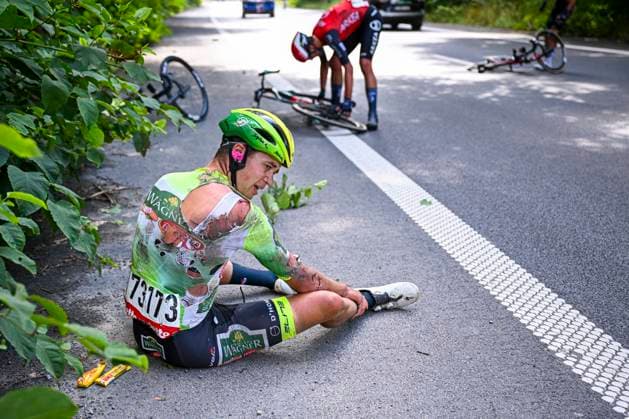 Tour de Wallonie 2025 Stage 3 ANTOING, BELGIUM - JULY 28 : Crash Meens Johan of Wagner Bazin WB during stage 3 of the 30th edition of Tour de Wallonie an UCI ProSeries 2.Pro cycling road race stage for Men Elite of 165.3 km with start in Estinnes and finish in Antoing on July 28, 2025 in Antoing, Belgium, 28 07 2025 ( Motordriver Pieter Van Herzele - Antoing Belgium  Copyright: xTomasxSiskx