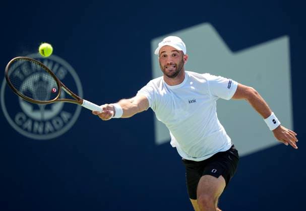 July 28, 2025, Toronto, On, CANADA: Dan Martin of Canada returns the ball against Jaume Munar of Spain during first round tennis action at the National Bank Open in Toronto on Monday, July 28, 2025. Canada News - July 28, 2025  - ZUMAc35_ 20250728_zaf_c35_058 Copyright: xNathanxDenettex