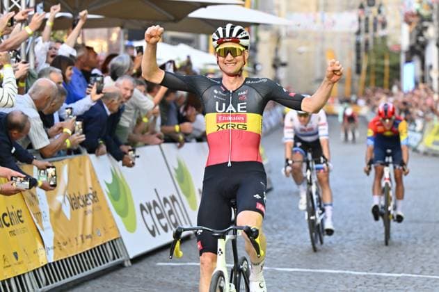 Belgian Tim Wellens of UAE Team Emirates celebrates as he crosses the finish line of the Natourcriterium Aalst cycling event, Monday 28 July 2025 in Aalst. The traditional criteriums are local showcases for which mainly cyclists who rode the Tour de France are invited. ERICxLALMAND  x130211745x