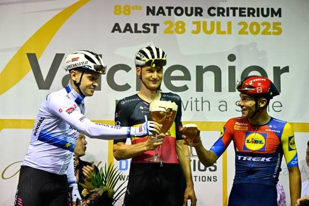 Belgian Tim Merlier of Soudal Quick-Step, Belgian Tim Wellens of UAE Team Emirates and Belgian Thibau Nys of Lidl-Trek pictured on the podium after the Natourcriterium Aalst cycling event, Monday 28 July 2025 in Aalst. The traditional criteriums are local showcases for which mainly cyclists who rode the Tour de France are invited. ERICxLALMAND  x130212379x