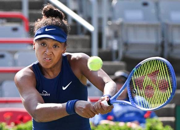 July 28, 2025, Montreal, Pq, Canada: Naomi Osaka, of Japan, plays a shot to Ariana Arseneault, of Canada, during their first round match at the National Bank Open tennis tournament in Montreal, Monday, July 28, 2025. Ariana Arseneault, Naomi Osaka, - ZUMAc35_ 20250728_zaf_c35_130 Copyright: xGrahamxHughesx