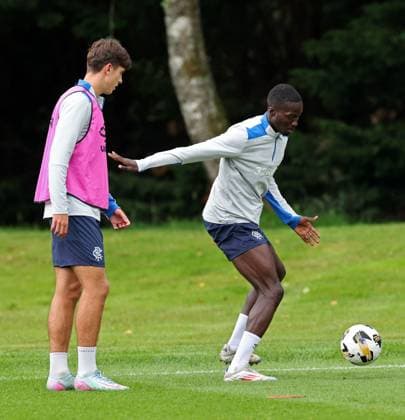 Zander Hutton and Mohamed Diomande training ahead of tomorrow s Champions League second leg qualifying match against Panathinaikos. Rangers Training - The Rangers Training Centre, Glasgow, Lanarkshire, Scotland, UK - 29 Jul 2025Glasgow The Rangers Training Centre Lanarkshire United Kingdom  Copyright: xO Rourke RangersxFC Shutterstockx 15419009a