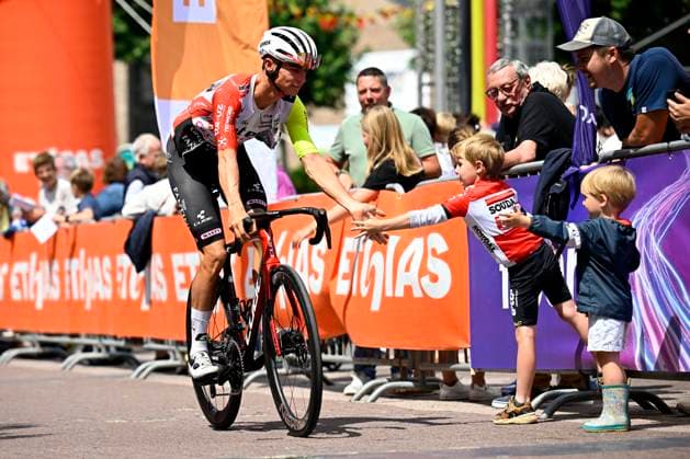 Tour de Wallonie 2025 Stage 4 SERAING, BELGIUM - JULY 29 : Rider of Intermarche - Wanty with a young fan of Lotto before the start of the race during stage 4 of the 30th edition of Tour de Wallonie an UCI ProSeries 2.Pro cycling road race stage for Men Elite of 163.3 km with start in Welkenraedt and finish in Seraing on July 29, 2025 in Seraing, Belgium, 29 07 2025 ( Motordriver Louis Bidlot - Seraing Belgium  Copyright: xTomasxSiskx