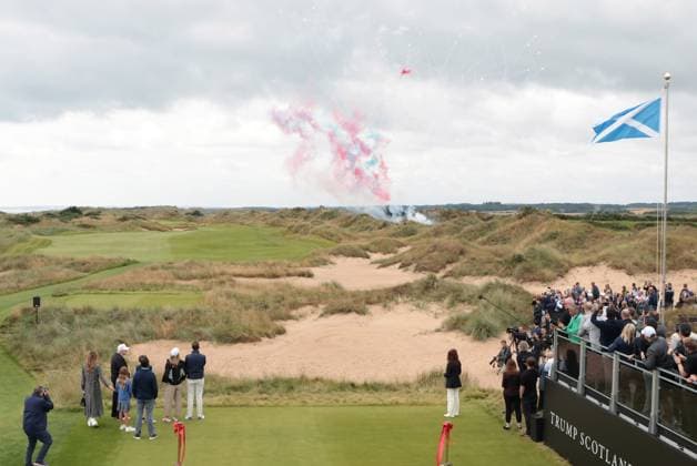 American President Donald Trump and his family watch fireworks at the opening of The New Course at Trump International Links, Aberdeen in Scotland on Tuesday, July 29, 2025. Trump is on a four day visit to Scotland where he will be playing golf and meeting International leaders for trade discussions.  LON2025072937 HUGOxPHILPOTT