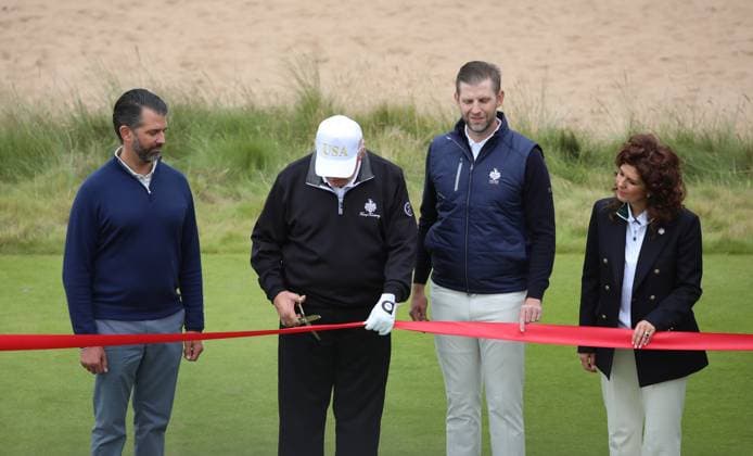 Donald Trump Jr, American President Donald Trump, Eric Trump and Sarah Malone after opening The New Course at Trump International Links, Aberdeen in Scotland on Tuesday, July 29, 2025. Trump is on a four day visit to Scotland where he will be playing golf and meeting International leaders for trade discussions.  LON2025072922 HUGOxPHILPOTT