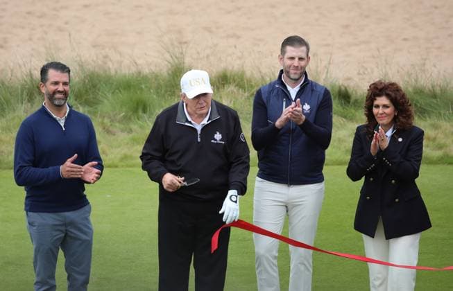 Donald Trump Jr, American President Donald Trump, Eric Trump and Sarah Malone after opening The New Course at Trump International Links, Aberdeen in Scotland on Tuesday, July 29, 2025. Trump is on a four day visit to Scotland where he will be playing golf and meeting International leaders for trade discussions.  LON2025072924 HUGOxPHILPOTT