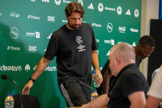 29th July 2025; Spiros Louis Olympic Stadium, Athens, Greece; Rangers press conference, PK, Pressekonferenz ahead of the UEFA Champions League Second Qualifying Round Match v Panathinaikos; Rangers Manager Russell Martin takes his seat during the press conference  VagelisxGeorgariou