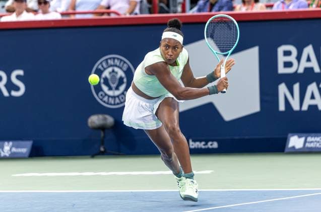 July 29, 2025, Montreal, Quebec, Canada: COCO GAUFF from USA back hand in first set against D. Collins from USA in round of 64 at Canadian Open at IGA stadium in Montreal. Gauff wins 7:5 4:6 7:6. Montreal Canada - ZUMAl189 20250729_zsp_l189_106 Copyright: xYannickxLegarex