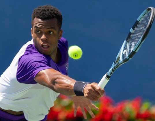 (250730) -- TORONTO, July 30, 2025 -- Giovanni Mpetshi Perricard hits a return during the men s singles second round match between Holger Rune of Denmark and Giovanni Mpetshi Perricard of France at the 2025 National Bank Open tennis tournament in Toronto, Canada, July 29, 2025. (Photo by Xinhua) (SP)CANADA-TORONTO-TENNIS-NATIONAL BANK OPEN-MEN S SINGLES ZouxZheng 