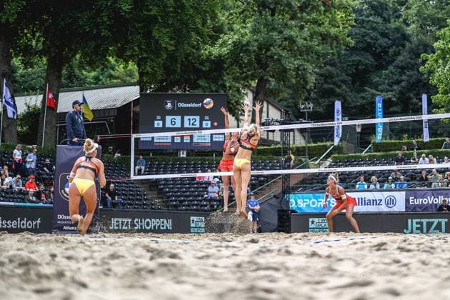 Beach volleyball I European Championship 2025 I Group stage I 30 07 2025 Aine Raupelyte Lithuania in attack against Louisa Lippmanns block Germany Düsseldorf Rochusclub Düsseldorfer Tennisclub e V Germany Copyright: xLobeca JasperxLorenzx