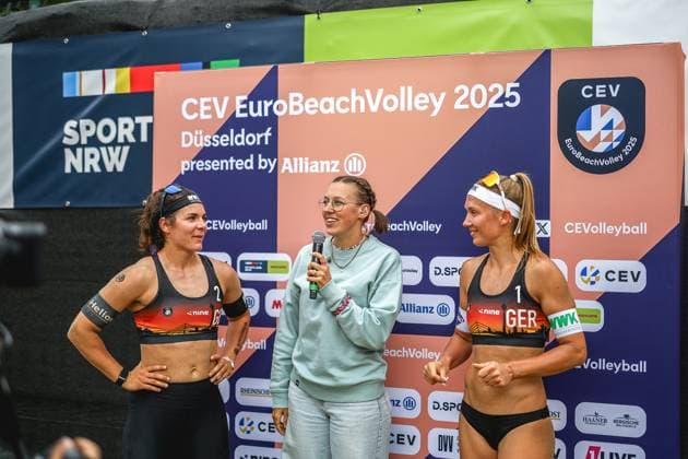 Beach volleyball I European Championship 2025 I Group stage I 30 07 2025 Anna Lena Grüne Germany at the winners interview with presenter Jana Schick together with Sandra Ittlinger Germany Düsseldorf Rochusclub Düsseldorfer Tennisclub e V Germany Copyright: xLobeca JasperxLorenzx