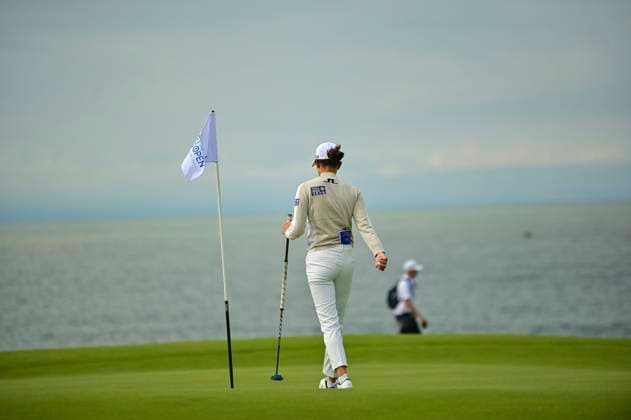 30th July 2025; Royal Porthcawl Golf Club, Porthcawl, Wales; AIG Womens Open Golf, Practice Day; Yealimi Noh walking towards the 2nd hole flag  AledxHopkins