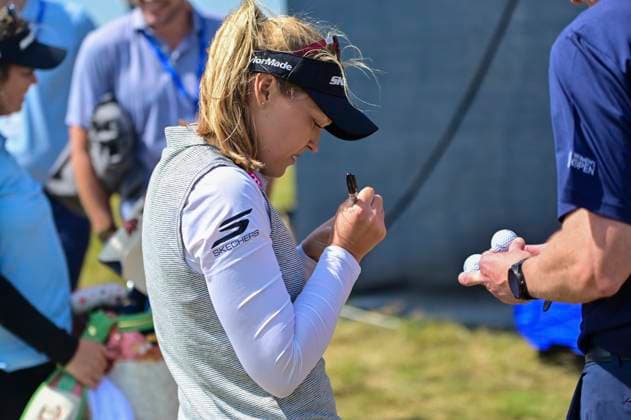 30th July 2025; Royal Porthcawl Golf Club, Porthcawl, Wales; AIG Womens Open Golf, Practice Day; Brooke Henderson signing a golf ball after her round  AledxHopkins