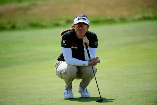 30th July 2025; Royal Porthcawl Golf Club, Porthcawl, Wales; AIG Womens Open Golf, Practice Day; Hannah Green lining up a putt on the 18th green  AledxHopkins