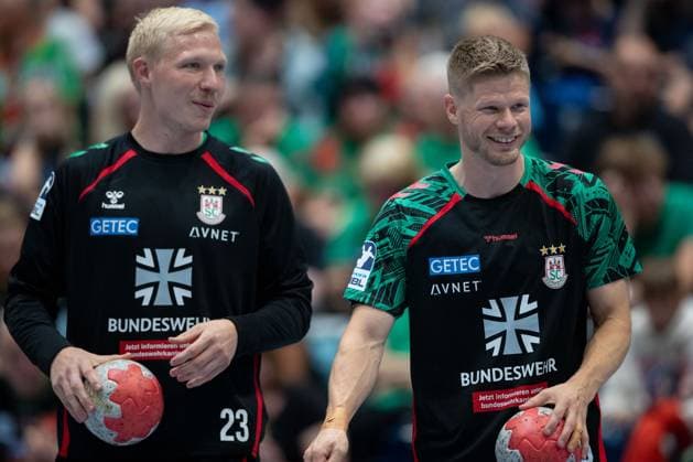 30 07 2025, xtgx, handball, test match, SC Magdeburg Fredericia Handboldklub v l Magnus Saugstrup Magdeburg, 23 , Sebastian Barthold Magdebug, 25 SC Magdeburg advertises on the warm-up jerseys for the Bundeswehr symbol photo, symbol image, advertising, sponsor, Bundeswehr, army, military Ilsenburg