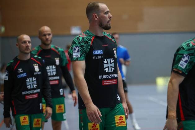 30 07 2025, xtgx, handball, test match, SC Magdeburg Fredericia Handboldklub v l SC Magdeburg advertises on the warm-up jerseys for the Bundeswehr symbol photo, symbol image, advertising, sponsor, Bundeswehr, army, military Ilsenburg