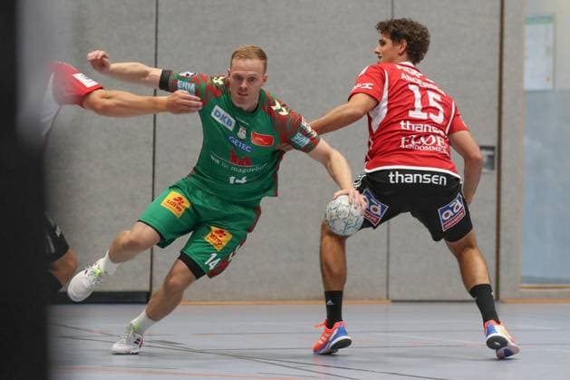 30 07 2025, xgox, handball test match SC Magdeburg Fredericia Handboldklub emspor, v l Omar Ingi Magnusson Magdeburg, 14 , Mad Kjeldgaard Fredericia, 15 duel, duel, fight, tackle Ilsenburg