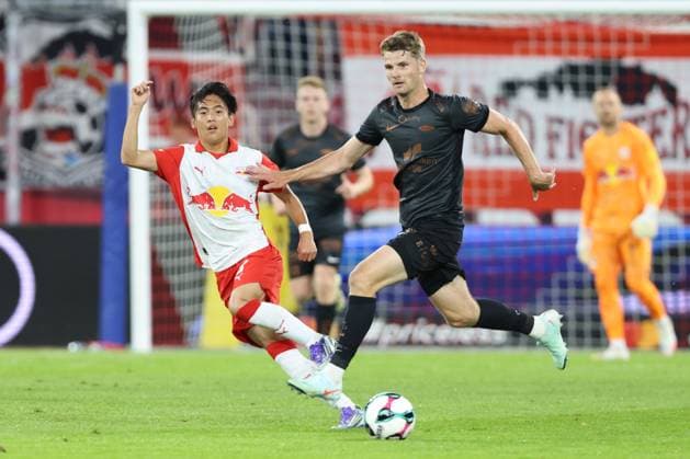 SOCCER - UEFA CL, RBS vs Brann SALZBURG,AUSTRIA,30.JUL.25 - SOCCER - UEFA Champions League, qualification, Red Bull Salzburg vs SK Brann Bergen. Image shows Sota Kitano (RBS) and Jacob Lungi Sorensen (Brann).  GEPAxpictures xMathiasxMandl