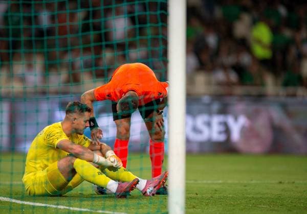 30th July 2025; Spiros Louis Olympic Stadium, Athens, Greece; UEFA Champions League Second Qualifying Round Second Leg Football, Panathinaikos versus Rangers; Referee Simone Sozza checks on the condition of Jack Butland of Rangers  VagelisxGeorgariou