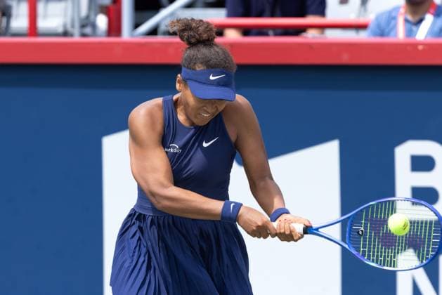 July 30, 2025, Montreal, Quebec, Canada: NAOMI OSAKA from Japan back hand in third set against Liudmila Samsonova in round of 64 at Canadian Open at IGA stadium in Montreal, Quebec, Canada on 2024-05-24 Montreal Canada - ZUMAl189 20250730_zsp_l189_027 Copyright: xYannickxLegarex