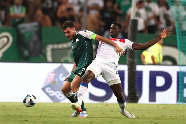 Fotis Ioannidis of Panathinaikos battles for the ball with Nasser Djiga of Rangers during the Champions League second qualifying round second leg match at the Athens Olympic Stadium, Greece. Panathinaikos v Rangers - UEFA Champions League Second Qualifying Round - Athens Olympic Stadium, Greece - 30 Jul 2025Athens Athens Olympic Stadium United Kingdom  Copyright: xO Rourke RangersxFC Shutterstockx 15420963et