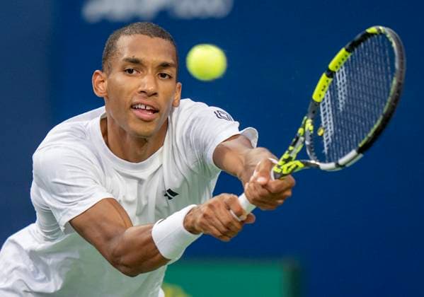 July 30, 2025, Toronto, On, Canada: Felix Auger-Aliassime of Canada lunges for a backhand return to Fabian Marozsan of Hungary during their match at the National Bank Open in Toronto on Wednesday July 30, 2025. Canada News - July 30, 2025  - ZUMAc35_ 20250730_zaf_c35_148 Copyright: xFrankxGunnx