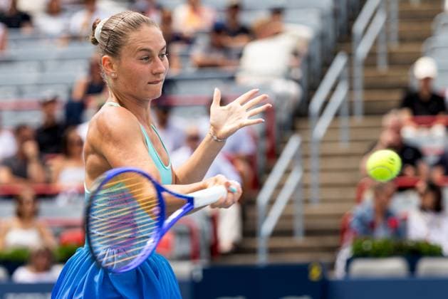 July 31, 2025, Montreal, Quebec, Canada: MARTA KOSTYUK (24) from Ukraine forehand in first set against Daria Kasatkina (15) from Australia in round of 32 at Canadian Open at IGA stadium in Montreal, Quebec, Canada on 2025-07-31 Montreal Canada - ZUMAl189 20250731_zsp_l189_006 Copyright: xYannickxLegarex