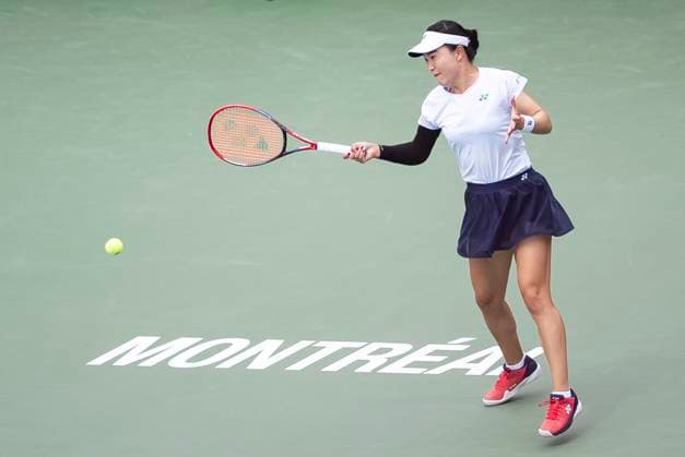 July 31, 2025, Montreal, Pq, CANADA: Lin Zhu, of China, returns a shot from Suzan Lamens, of the Netherlands, during third round tennis action at the National Bank Open tennis tournament in Montreal on Thursday, July 31, 2025. Canada News - July 31, 2025 - ZUMAc35_ 20250731_zaf_c35_035 Copyright: xChristopherxKatsarovx