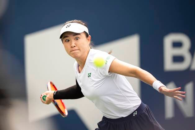 July 31, 2025, Montreal, Pq, CANADA: Lin Zhu, of China, returns a shot from Suzan Lamens, of the Netherlands, during third round tennis action at the National Bank Open tennis tournament in Montreal on Thursday, July 31, 2025. Canada News - July 31, 2025 - ZUMAc35_ 20250731_zaf_c35_036 Copyright: xChristopherxKatsarovx