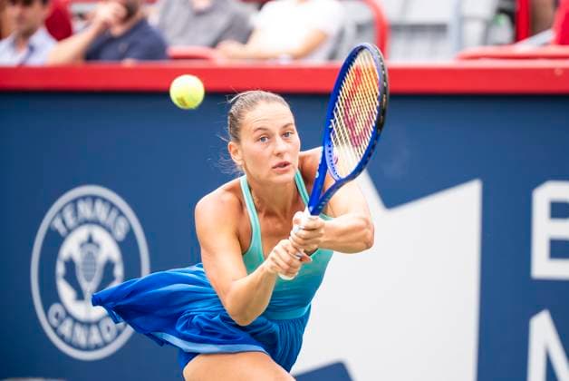 July 31, 2025, Montreal, Pq, CANADA: Marta Kostyuk, of Ukraine, hits a return against Daria Kasatkina, of Australia, during third round tennis action at the National Bank Open tennis tournament in Montreal on Thursday, July 31, 2025. Canada News - July 31, 2025 - ZUMAc35_ 20250731_zaf_c35_058 Copyright: xChristopherxKatsarovx