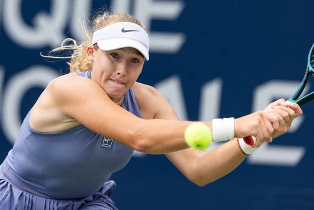 July 31, 2025, Montreal, Quebec, Canada: MIRA ANDREEVA (4) back hand in first set against McCartney Kessler (28) from USA in round of 32 at Canadian Open at IGA stadium in Montreal, Quebec, Canada on 2025-07-31 Montreal Canada - ZUMAl189 20250731_zsp_l189_047 Copyright: xYannickxLegarex