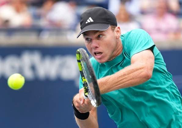 July 31, 2025, Toronto, On, CANADA: Alex Michelsen of the United States returns the ball against Lorenzo Musetti of Italy during third-round tennis action at the National Bank Open in Toronto on Thursday, July 31, 2025. Canada News - July 31, 2025  - ZUMAc35_ 20250731_zaf_c35_094 Copyright: xNathanxDenettex