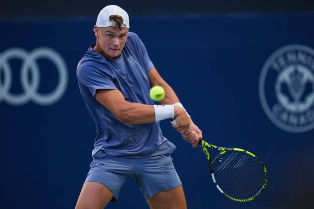 ATP, Tennis Herren Masters 1000 National Bank Open Toronto Presented by Rogers 2025 - Day 6 Holger Rune of Denmark plays a backhand against Alexandre Muller of France during the Men s Singles third round match on day 6 of the ATP Masters 1000 National Bank Open at Sobeys Stadium. on July 31, 2025 in Toronto, Canada. (Photo by Leonardo Ramirez Eyepix Group) Copyright: xLeonardoxRamirezx xEyepixxGroupx LR-31072025-07534