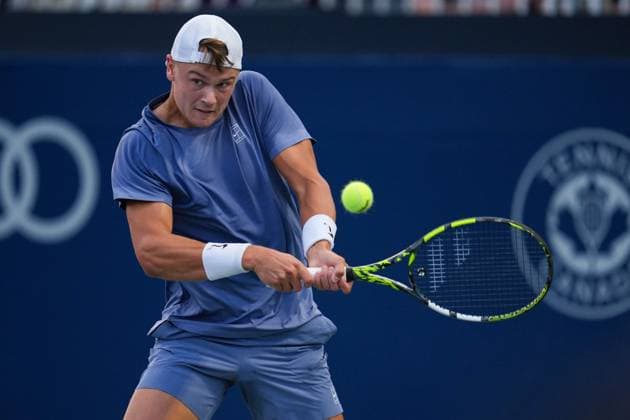 July 31, 2025, Toronto, Ontario, Canada: Holger Rune of Denmark plays a backhand against Alexandre Muller of France during the Men s Singles third round match on day 6 of the ATP, Tennis Herren Masters 1000 National Bank Open at Sobeys Stadium. on July 31, 2025 in Toronto, Canada. Toronto Canada - ZUMAe321 20250731_zsa_e321_120 Copyright: xLeonardoxRamirezx