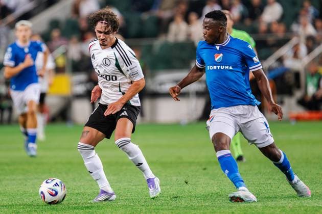 July 31, 2025, Warsaw, Poland: Migouel Alfarela (L) of Legia and Patrick Kpozo (R) of Banik are seen in action during the 2nd round qualifying UEFA Europa League match between Legia Warszawa and FC Banik Ostrava at Marshal Jozef Pilsudski Legia Warsaw Municipal Stadium. Final score; Legia Warszawa 2:1 FC Banik Ostrava. Warsaw Poland - ZUMAs197 20250731_aaa_s197_202 Copyright: xMikolajxBarbanellx