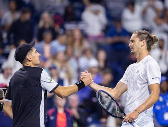 (250801) -- TORONTO, Aug. 1, 2025 -- Alexander Zverev (R) of Germany shakes hands with Matteo Arnaldi of Italy after the third round of the men s singles match between Alexander Zverev of Germany and Matteo Arnaldi of Italy at the 2025 National Bank Open tennis tournament in Toronto, Canada, July 31, 2025. (Photo by Xinhua) (SP)CANADA-TORONTO-TENNIS-NATIONAL BANK OPEN-MEN S SINGLES ZouxZheng 