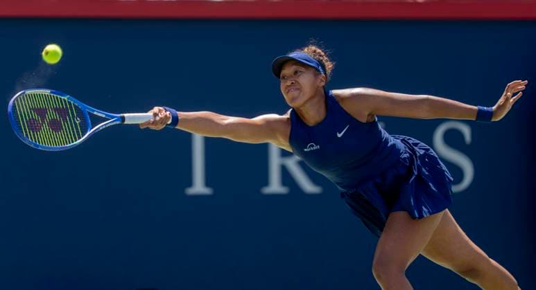August 1, 2025, Montreal, Pq, Canada: Naomi Osaka of Japan hits a return to Jelena Ostapenko of Latvia during third round tennis action at the National Bank Open in Montreal, Friday, Aug. 1, 2025. Canada News - August 1, 2025  - ZUMAc35_ 20250801_zaf_c35_027 Copyright: xChristinnexMuschix