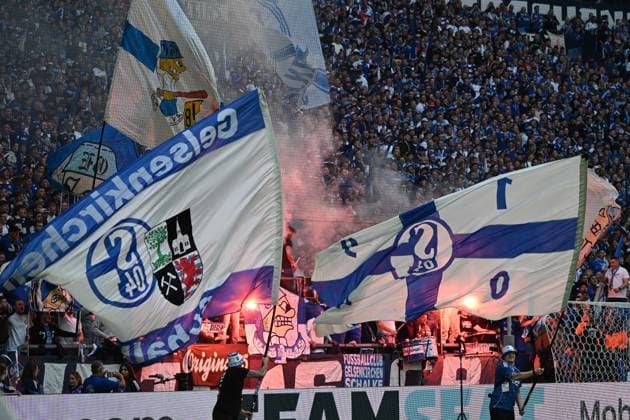 Fans Schalke 94 supporters use pyrotechnics before the game during the 2 Bundesliga match between FC Schalke 04 and Hertha BSC, Veltins Arena on August 01, 2025 in Gelsenkirchen, Germany Photo by Ralf Treese DeFodi Images Fans Schalke 94 supporters use pyrotechnics before the game during the 2 Bundesliga match between FC Schalke 04 and Hertha BSC at Veltins Arena on August 1, 2025 in Gelsenkirchen, Germany Photo by Ralf Treese DeFodi Images DFB DFL REGULATIONS PROHIBIT ANY USE OF PHOTOGRAPHS AS IMAGE SEQUENCES AND OR QUASI VIDEO Photo by Ralf Treese DeFodi Images