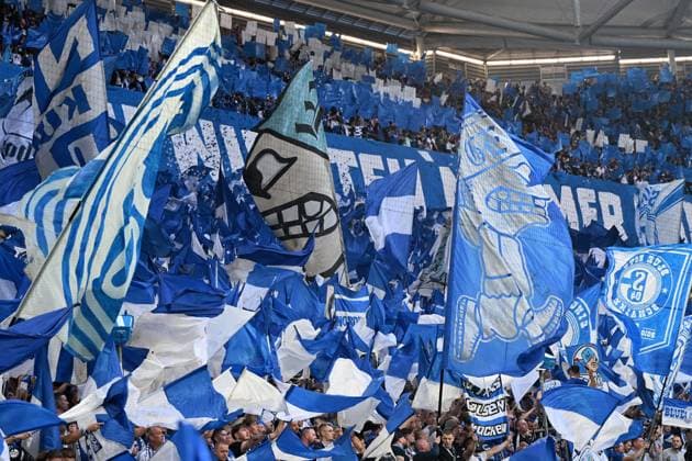 Fans Schalke 04 with flags banner during the 2 Bundesliga match between FC Schalke 04 and Hertha BSC, Veltins Arena on August 01, 2025 in Gelsenkirchen, Germany Photo by Ralf Treese DeFodi Images Fans Schalke 04 with flags banner during the 2 Bundesliga match between FC Schalke 04 and Hertha BSC at Veltins Arena on August 1, 2025 in Gelsenkirchen, Germany Photo by Ralf Treese DeFodi Images DFB DFL REGULATIONS PROHIBIT ANY USE OF PHOTOGRAPHS AS IMAGE SEQUENCES AND OR QUASI VIDEO Photo by Ralf Treese DeFodi Images